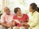 Seniors Lifestyle Magazine Senior Couple Talking To Financial Planner