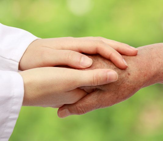 bigstockNursehelpingseniorinnaturescaled