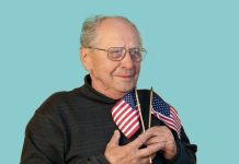 bigstockSeniorManWithAmericanFlagscaled