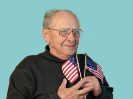 bigstockSeniorManWithAmericanFlagscaled