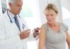 bigstock Doctor injecting flu vaccine t 102391031 scaled