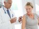 bigstock Doctor injecting flu vaccine t 102391031 scaled