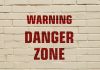 bigstock Inscription Warning Danger Zon 202621855 scaled
