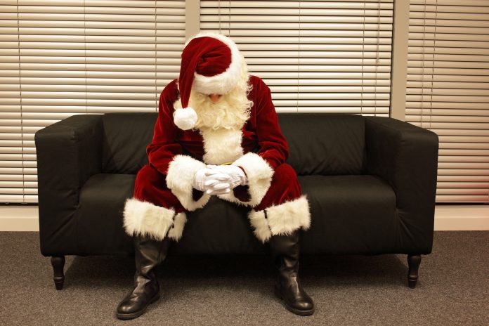 bigstock Sad and depressed Santa Claus 158990069 scaled