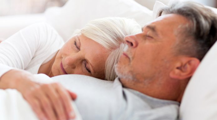 bigstock Senior couple sleeping in bed 150187760 scaled