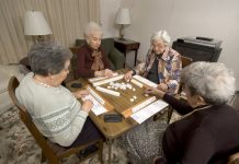 bigstock Senior Woman At The Game Table 1143562 scaled