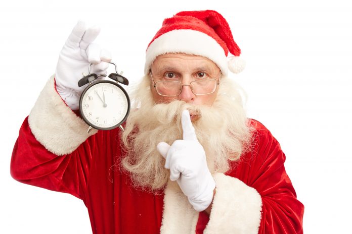 Santa Claus with alarm clock s 70701454 scaled