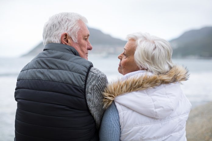 bigstock Rear view of senior couple sit 259129510 1 scaled