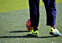 Man playing walking football outside scaled