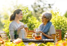 women drinking tea in the garden