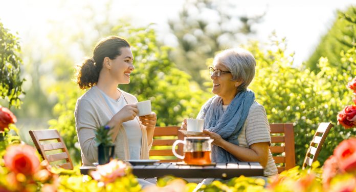 women drinking tea in the garden