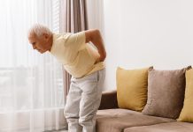 Senior man is suffering from pain in lower back