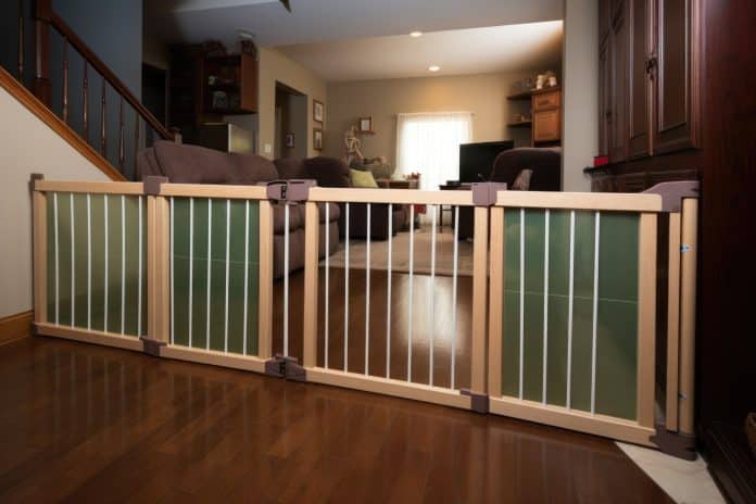 staircase with baby gates mounted at each end