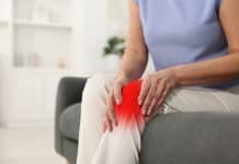 Arthritis,Symptoms.,Woman,Suffering,From,Pain,In,Her,Knee,On