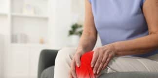 Arthritis,Symptoms.,Woman,Suffering,From,Pain,In,Her,Knee,On